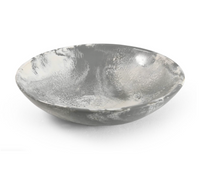 The Siler Resin Bowl by Go Home is a handcrafted, shallow round bowl featuring a marbled gray and white design—ideal as a decorative accent or food-safe serving piece.