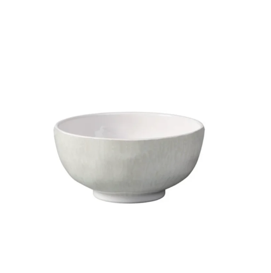 The Merritt Reactive Glaze Melamine Beige Dip Bowl features a round design with a slightly flared rim and small base—perfect for outdoor entertaining, this shatterproof piece of dinnerware suits any setting.