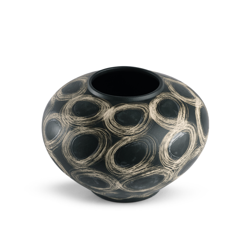 The Wren Vase - Black by FlowDecor Inc. is a round, black ceramic vase with a wide silhouette, narrow opening, and beige hand-drawn swirls covering its surface.