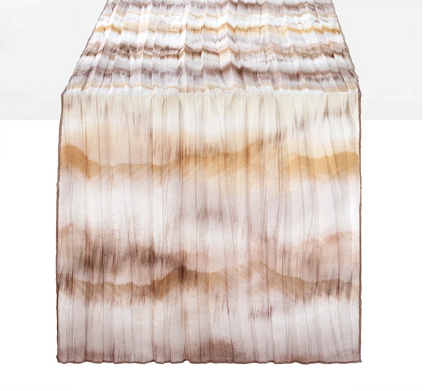 Sonata Table Runner 90″ - Honey pleated table runner featuring a textured finish and a horizontal tie-dye pattern in shades of honey and brown.