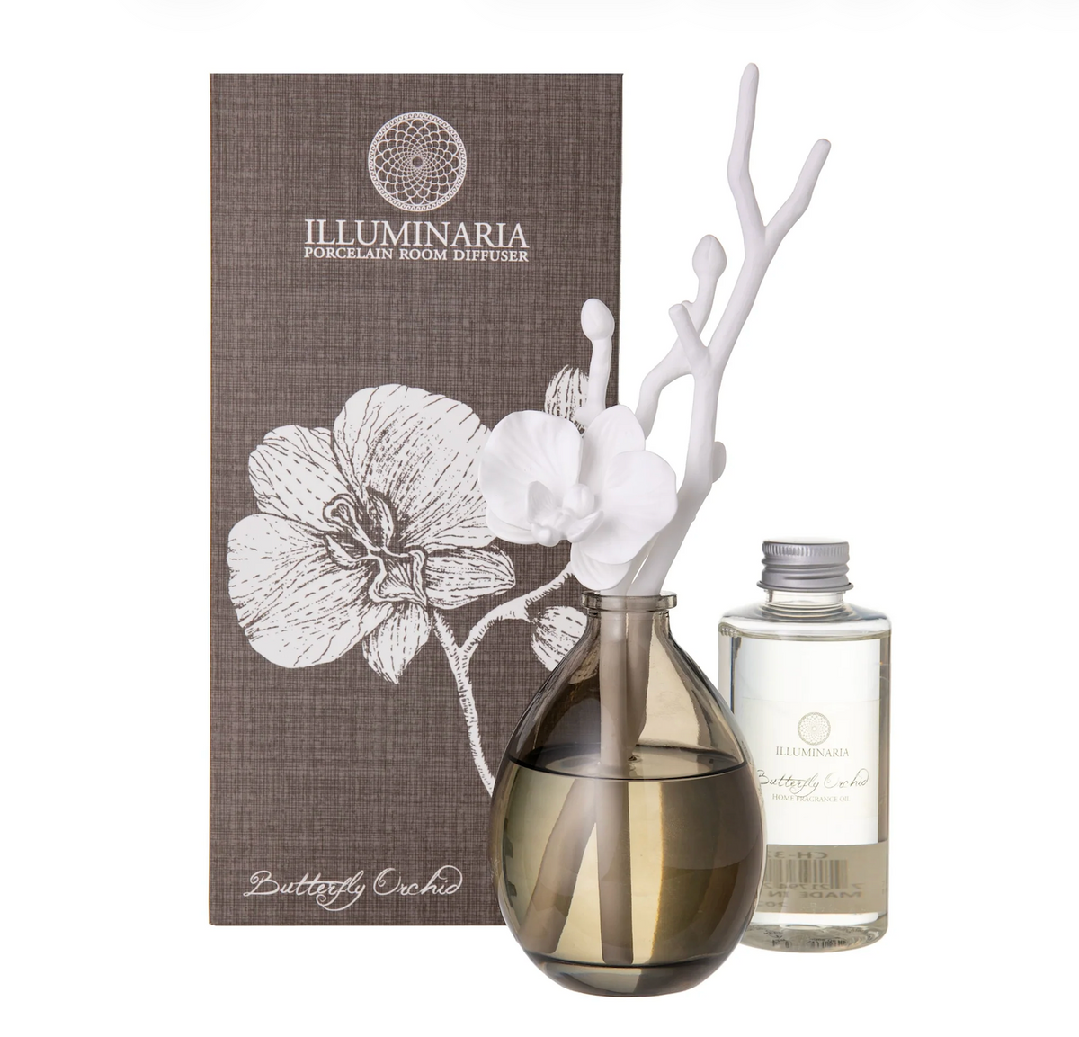 The Zodax Butterfly Orchid Diffuser features a smoky glass vase, white orchid-shaped diffuser sticks, fragrance oil, and comes in a decorative orchid-themed box.