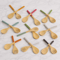 Ten pairs of Albert L Bamboo Classic Salad Servers Set Long, featuring eco-friendly servers with colorful handles (orange, green, gray, red, brown, teal), are arranged in rows; each set includes a large bamboo spoon and fork.