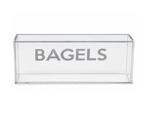 Introducing the Eye Candy Bagel Tray—a clear, rectangular acrylic box featuring the word “BAGELS” in bold gray lettering across the front. This food-safe tray, shown empty against a plain white background, is ideal for gifting or adding a touch of style to your countertop organization.