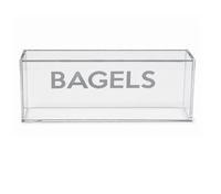 Introducing the Eye Candy Bagel Tray—a clear, rectangular acrylic box featuring the word “BAGELS” in bold gray lettering across the front. This food-safe tray, shown empty against a plain white background, is ideal for gifting or adding a touch of style to your countertop organization.