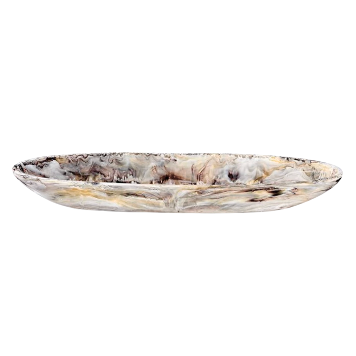 The Nashi Home Swirl Resin Colored Boat Bowl Mocha is an oval, shallow serving bowl featuring a marbled design in shades of white, gray, brown, and beige; decorative and shatter-resistant, it is displayed here on a white background.