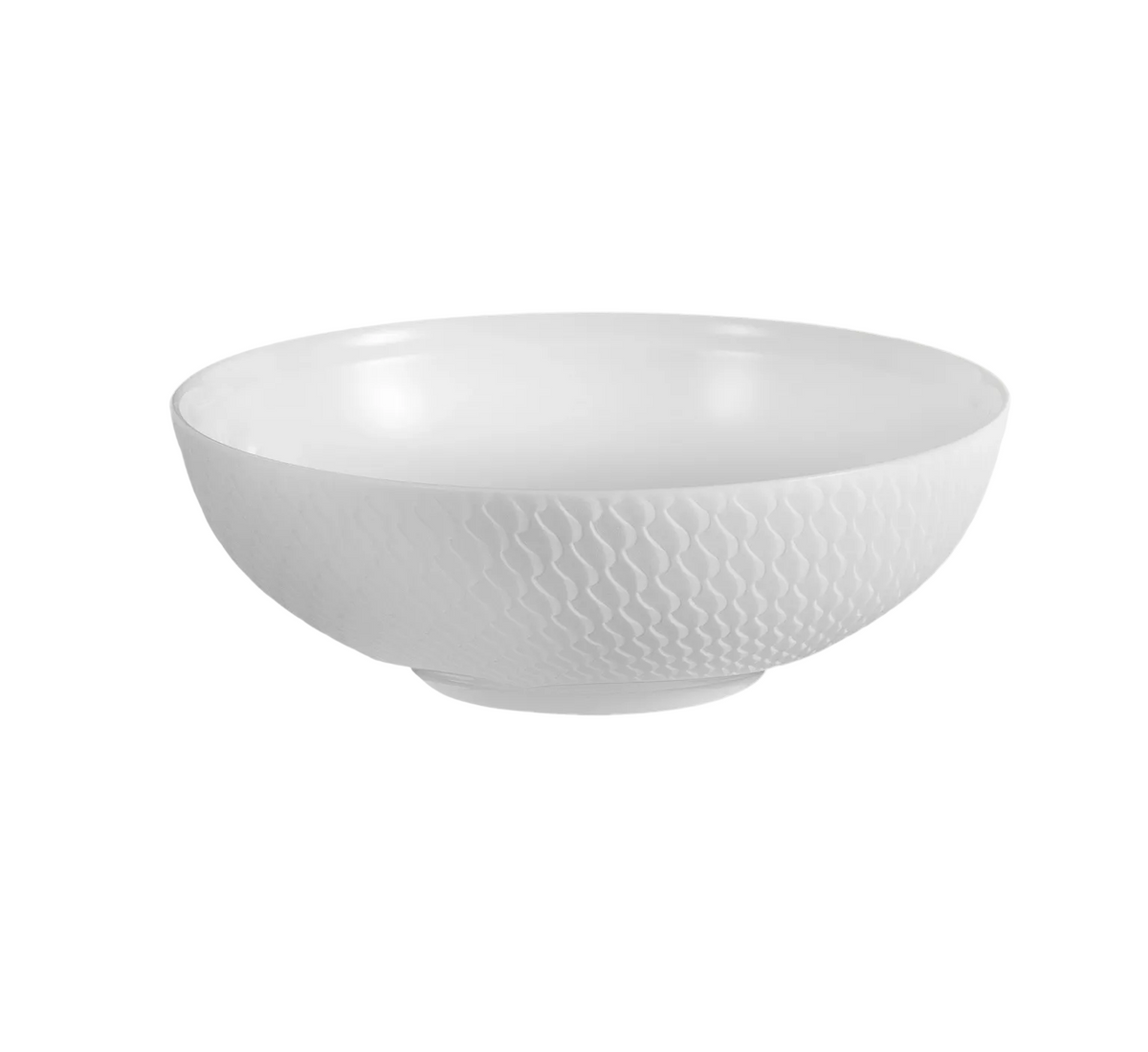 The Waves Relief N°41 Dinnerware by Meissen features a white ceramic bowl adorned with a textured, honeycomb-like pattern on its outer surface, evoking modern elegance against a plain light background.