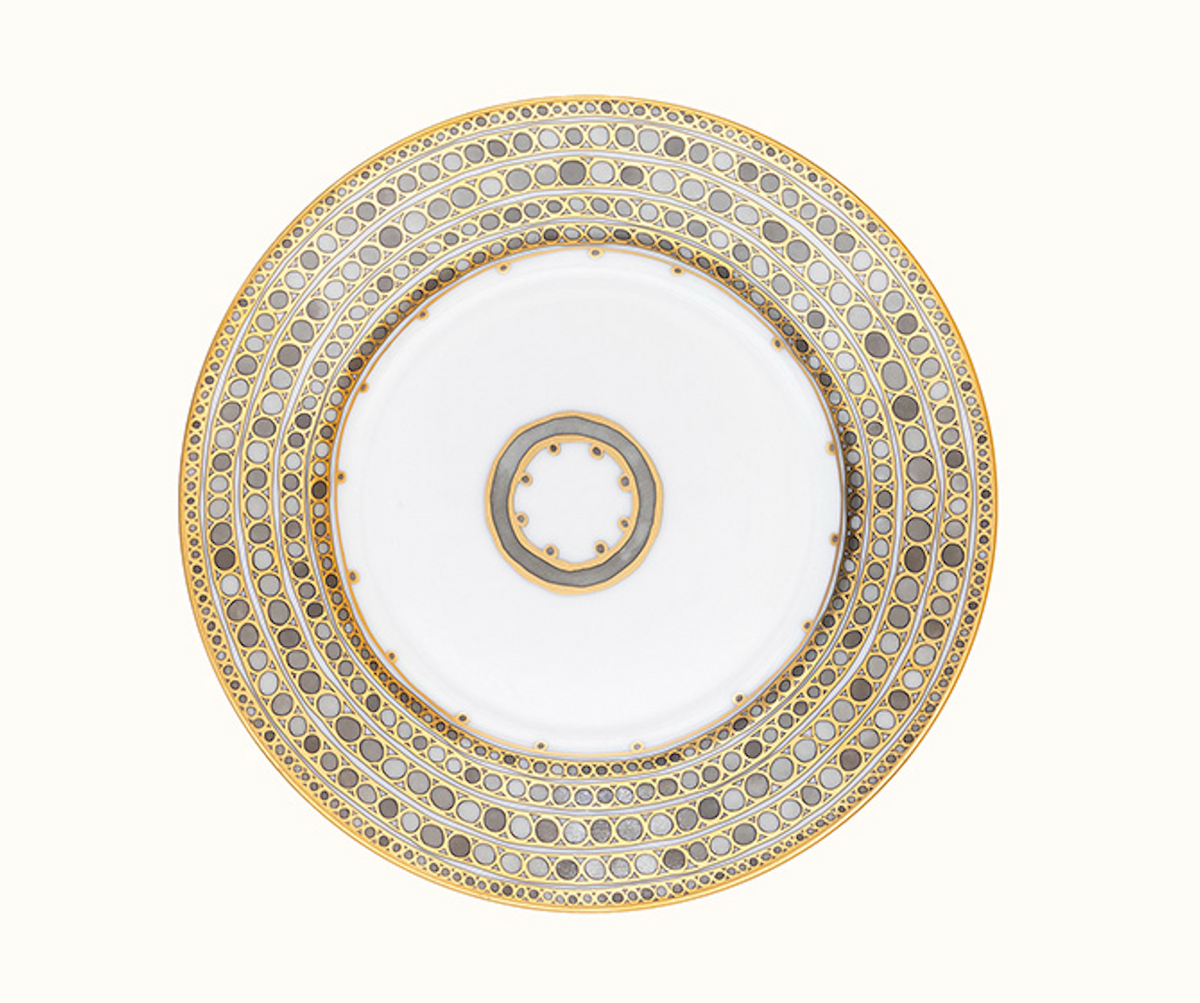 Haviland & Parlon Syracuse Dinnerware- Taupe porcelain dinner plate featuring a repeating pattern of grey circles and gold borders, with a matching smaller plate centered on top.