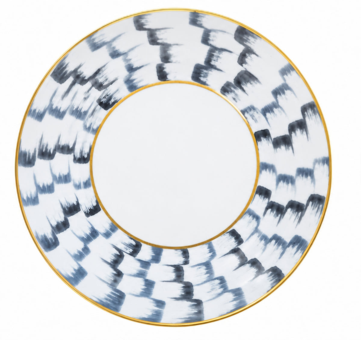 Marie Daâge Zephyr 1 dinner plate in hand-painted white porcelain, featuring a wide border of dark, brushstroke-style markings and a thin gold rim.