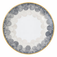 A white Marie Daâge Cercle D’Ecailles Platinum Filet porcelain plate featuring a circular pattern of overlapping grey and light grey scale motifs with a thin gold rim.
