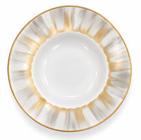 Marie Daâge Panache white Limoges porcelain soup bowl featuring a wide rim with a radiating pattern of hand-painted gold and grey brushstrokes and a gold-trimmed edge.