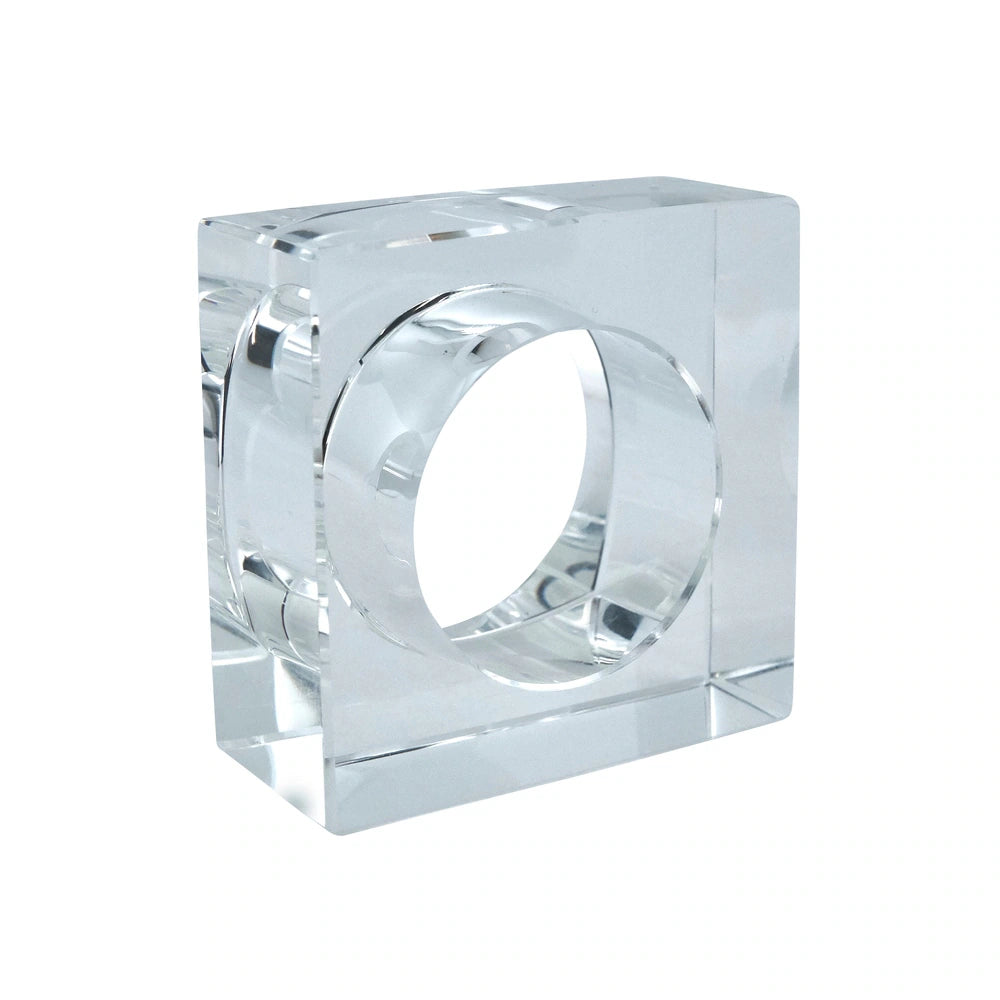 Elevate your dining decor with the Tizo Crystal Cube Napkin Ring Set of 4 – Clear. Featuring square-shaped, clear crystal napkin rings with a circular center, these modern accents add a touch of elegance to any table setting. Photographed on a white background for a sophisticated look.