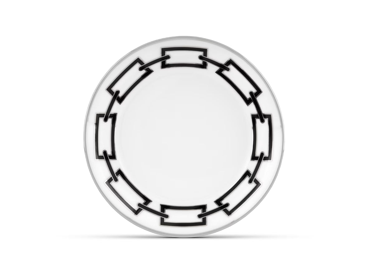 A Ginori 1735 Catene Nero Dinnerware plate featuring a bold, geometric black linked pattern around the rim, set against a plain white background.