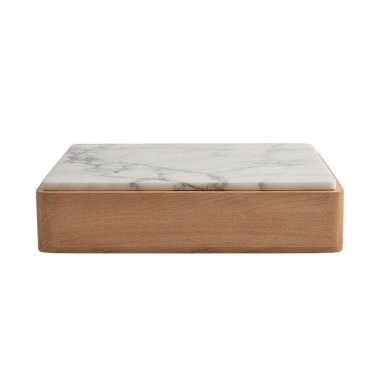 The Terreno Box by Greg Natale features a rectangular wooden base and a white marble lid with gray veining, shown from the front against a white background.