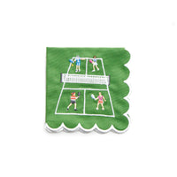 Pomegranate’s Day At The Courts Cocktail Napkin Set of 4 features green cotton napkins with scalloped white borders, embroidered with four people playing tennis—ideal for adding playful charm to any gathering.