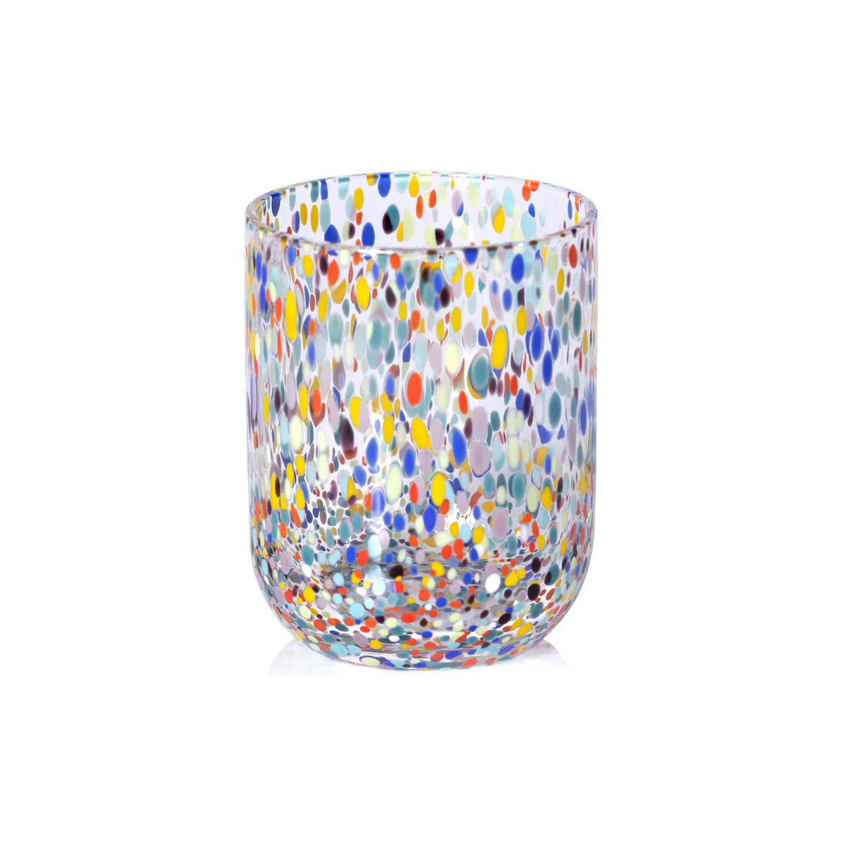 The Zodax Spritz Sprinkles Tumbler is a clear glass adorned with blue, yellow, red, orange, and white irregular dots—vibrant drinkware ideal for festive table settings and lively gatherings.