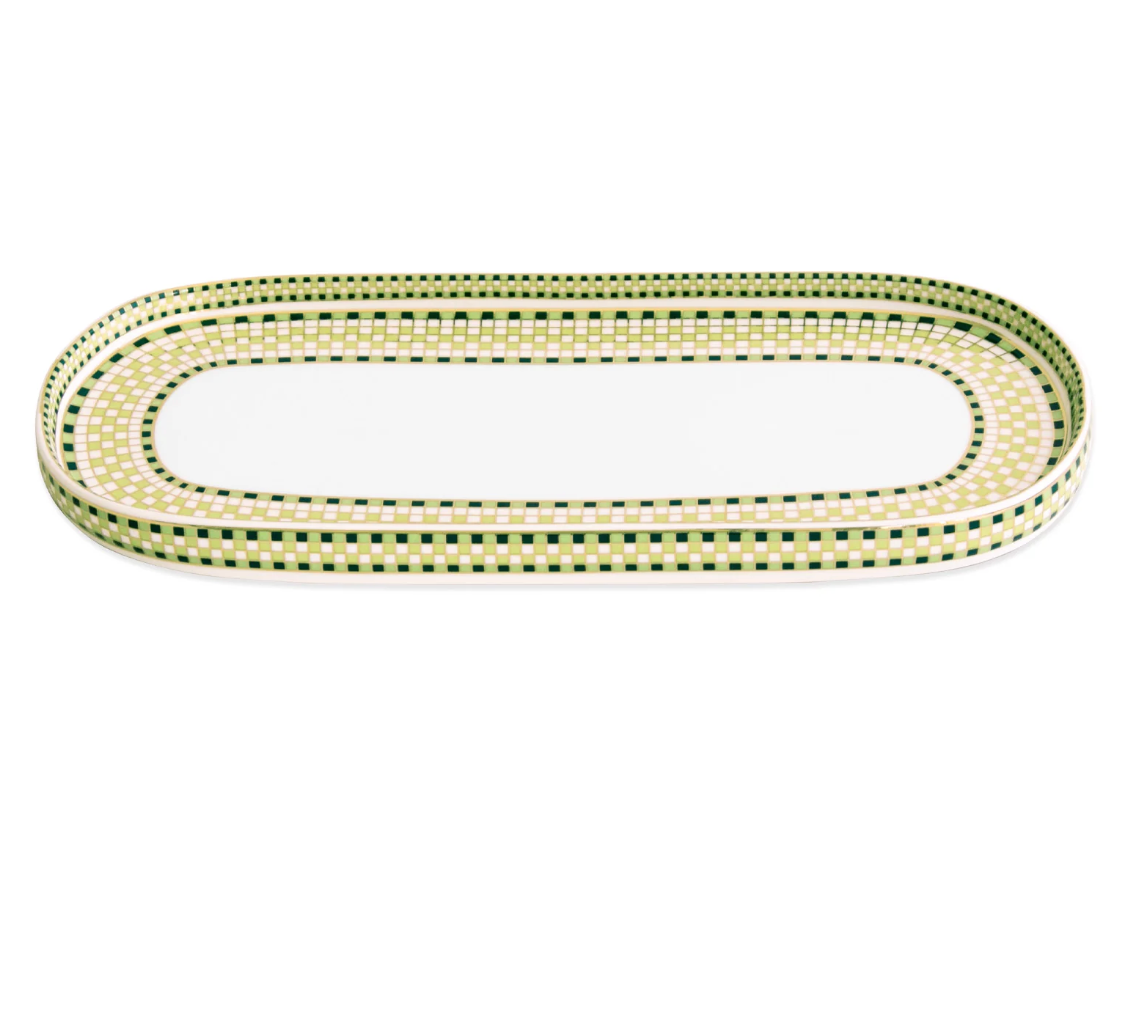Beatriz Ball’s Ceramic Ravenna Long Oval Platter in Green & Gold features a smooth, glossy finish and a white center, accented by a checkered green, yellow, and black border pattern with a slightly raised rim.