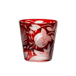 A deep red luxury Verdure Vodka / Liqueur -Bright Colors - crystal tumbler, decorated with etched white floral and botanical patterns.