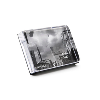 Glass tray with black and white cityscape design on a light gray background