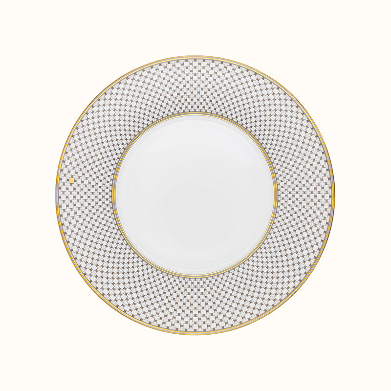 The Mottahedeh/Robert Haviland Home Dinnerware- Gold is a round white plate featuring a wide, intricate gold and gray geometric rim and a thin gold edge, shown from above against a plain background.