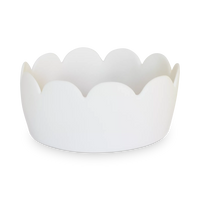The Tina Frey Fleur Bowl White features a round shape with scalloped edges, handcrafted from resin and photographed against a simple white background.