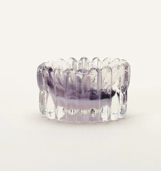 The Splash Catchall Bowl by Gary Bodker is a small, round, clear handcrafted glass dish with vertical textured ridges and a hint of purple at the base, shown on a plain white background.