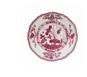 The Faenza Melamine Dinnerware Deep Pink Set of 4 by Beatriz Ball features a white base with deep pink floral and geometric patterns along the border and center, reminiscent of Italian ceramic plate designs.