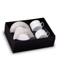 Two white fine porcelain Aegean Filet Platinum espresso cups and saucers by L’Objet with textured platinum accents in a black presentation box.