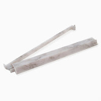 Two white, marble-patterned plastic drawer dividers from the Oh My Mahjong brand are shown on a plain white background. Inspired by the sleek design of the Mahjong Rack & Pusher Set - Carrara, each divider features adjustable ends to fit various drawer sizes.