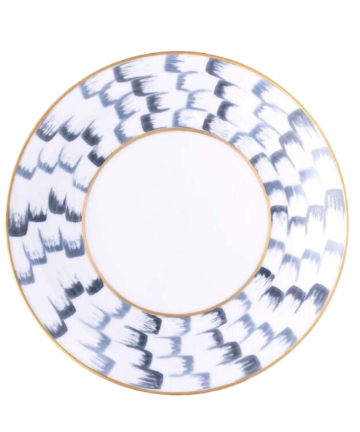 The Marie Daâge Zephyr 1 Dinnerware by Marie Daâge is a round white porcelain plate featuring a wide rim with hand-painted black brushstroke-like marks and two thin gold bands on the rim and inner edge.