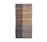 A folded Current Home NY Henley Napkin in Brown & Multi, from a set of 4, showcasing a plaid pattern in shades of brown, beige, gray, and blue with a decorative gold embroidered border on one side.