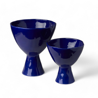 Two Compote Footed Bowls in Blue are featured in this photo. 