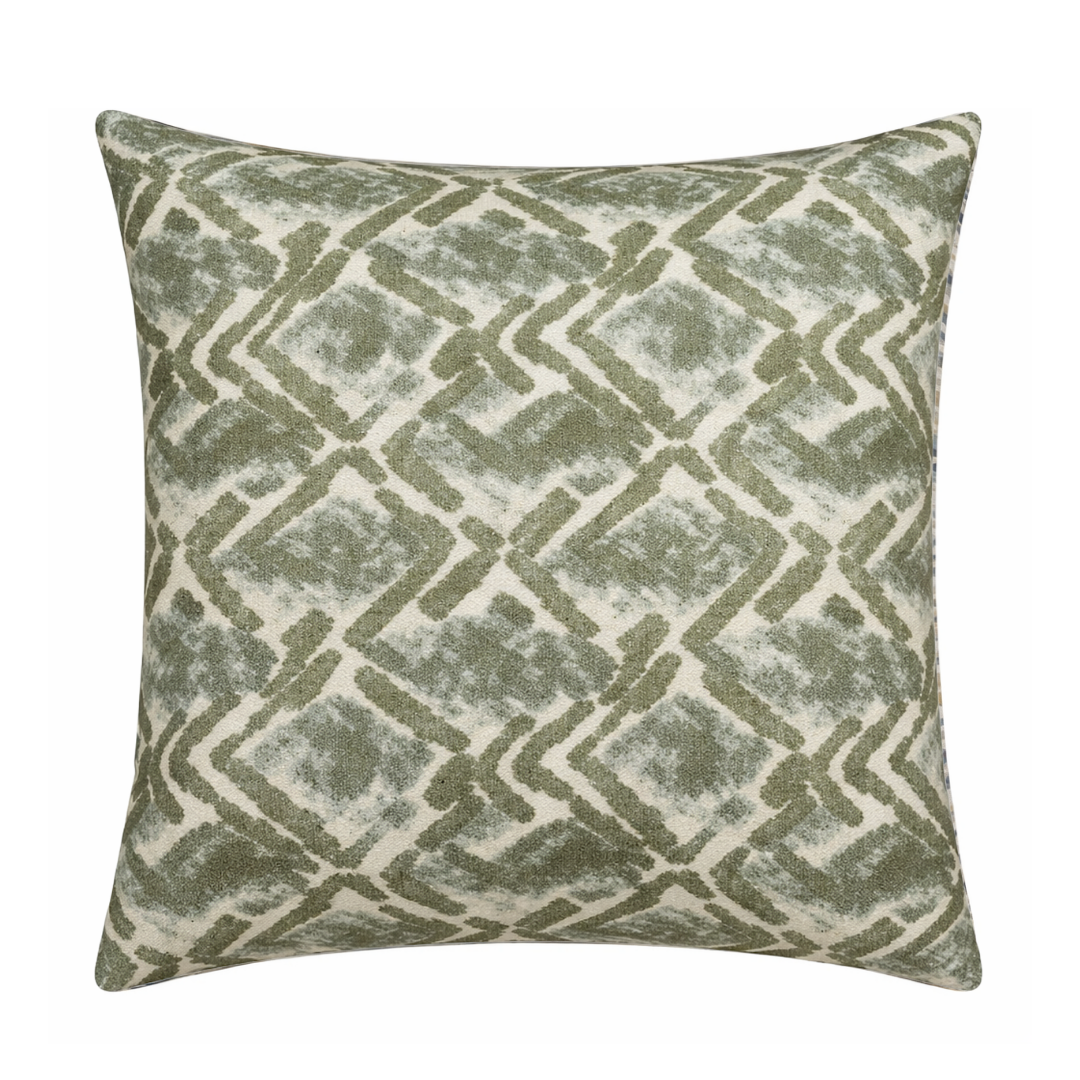 The Landmark Pillow Spruce by Decor Fifty-Five features a green and cream geometric pattern with intersecting lines and diamond shapes, crafted from textured fabric for a modern plush accent.