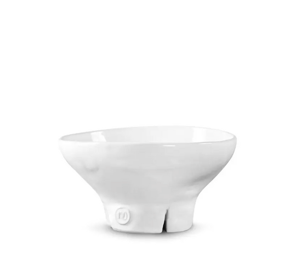 Introducing the Montes Doggett Ceramic Serveware - Catchall Bowl 257: a white ceramic bowl featuring a wide rim, narrow base, and a small circular emblem on the lower side. Set against a plain white background, this versatile piece blends functionality with minimalist style—perfect for any modern table.