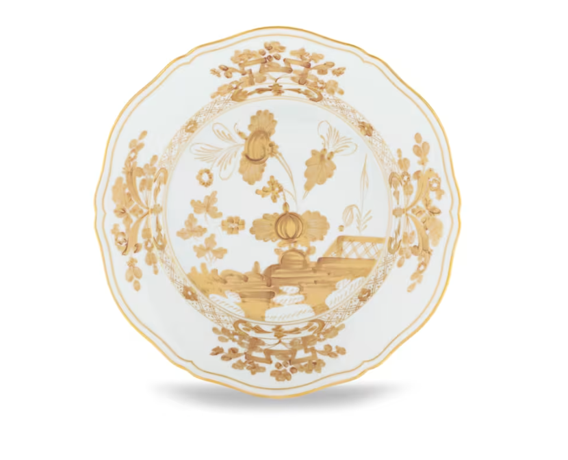 Oriente Italiano Aurum porcelain plate by Ginori 1735, featuring ornate white porcelain with scalloped edges, intricate gold floral motifs, and a delicately hand-painted border, photographed on a white background.