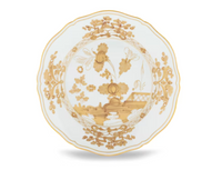 Oriente Italiano Aurum porcelain plate by Ginori 1735, featuring ornate white porcelain with scalloped edges, intricate gold floral motifs, and a delicately hand-painted border, photographed on a white background.
