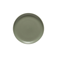 A plain, round, artichoke-green ceramic plate from the Casafina/Costa Nova Pacifica Dinnerware collection is shown from above on a white background, exemplifying refined luxury tableware.