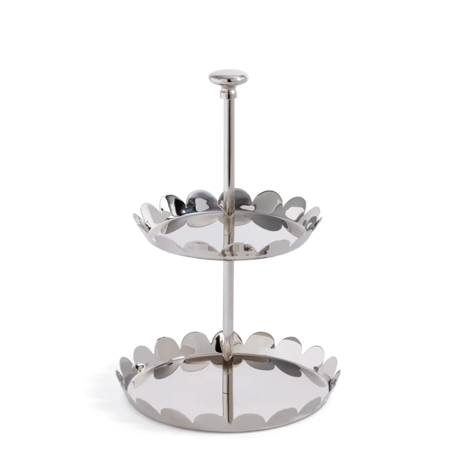 The Zodax Scala Two Tier Tray in shiny nickel features scalloped-edge circular trays, a central vertical rod, and a round handle for a modern, decorative look.