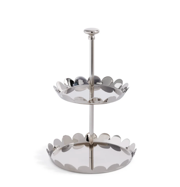 The Zodax Scala Two Tier Tray in shiny nickel features scalloped-edge circular trays, a central vertical rod, and a round handle for a modern, decorative look.