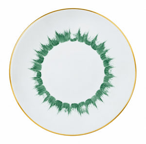 Marie Daâge Iris 1 dinner plate in white Limoges porcelain featuring a green brushstroke pattern in a circular motif and a gold rim.
