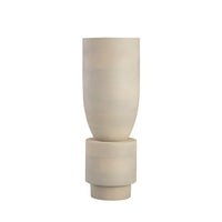 The Bastone Vase by Elk Group features a minimalist, modern design in cream with a tall cylindrical top and wide base, perfect for contemporary spaces. Shown against a white background.