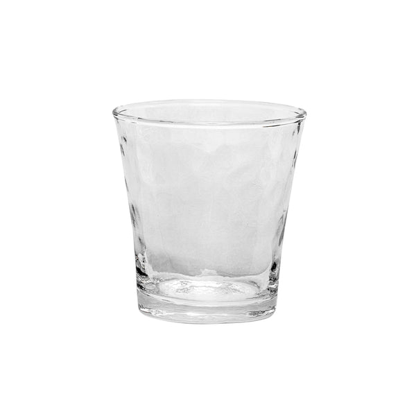 The Puro Glassware tumbler by Juliska features a clear, textured design with a flared rim and is dishwasher safe for easy cleaning—shown empty against a white background.