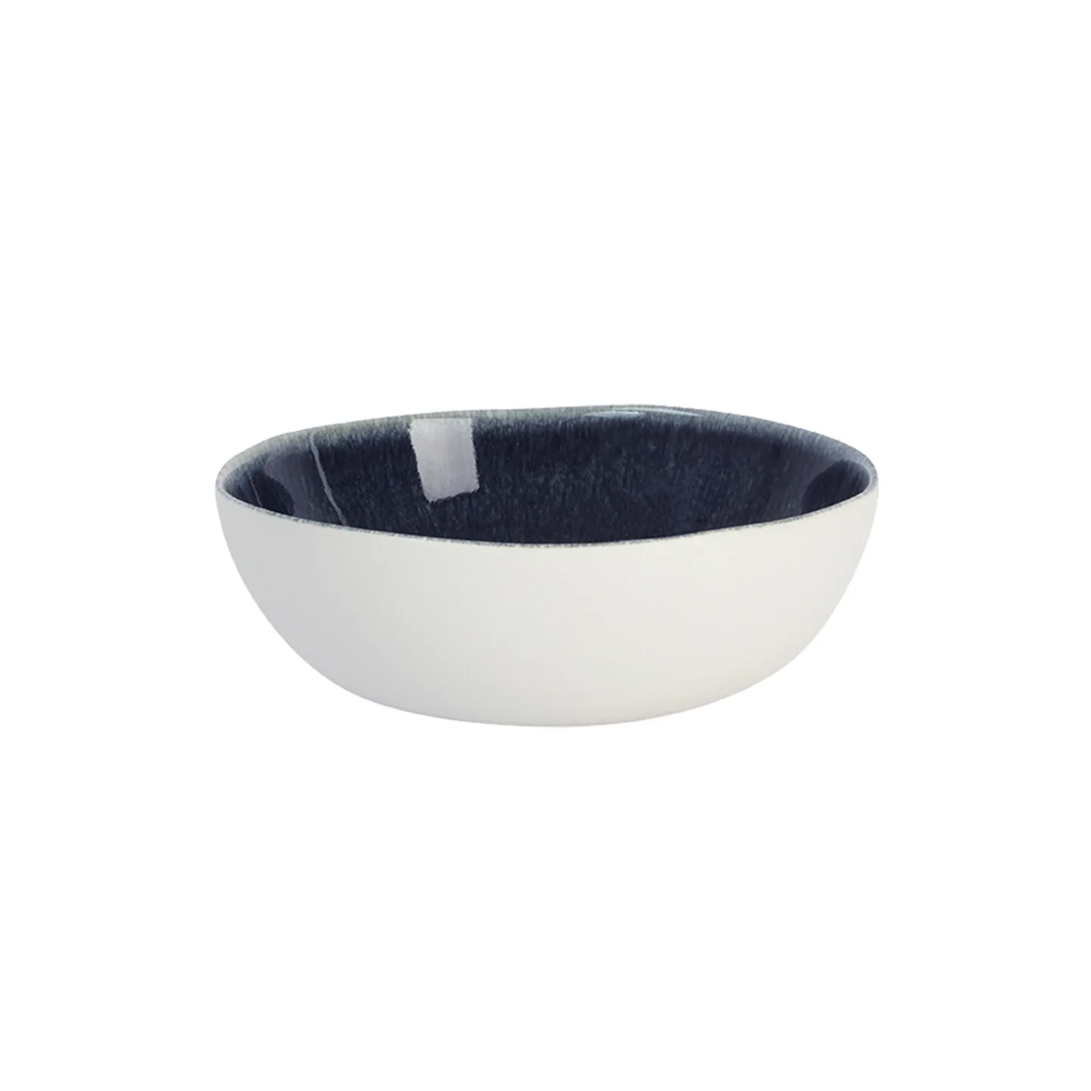 The Maguelone Midnight Blue Dinnerware bowl by Jars - Rosenthal features a smooth white exterior and glossy dark blue interior, handcrafted and displayed against a white background—an elegant piece for any artisanal dinnerware set.