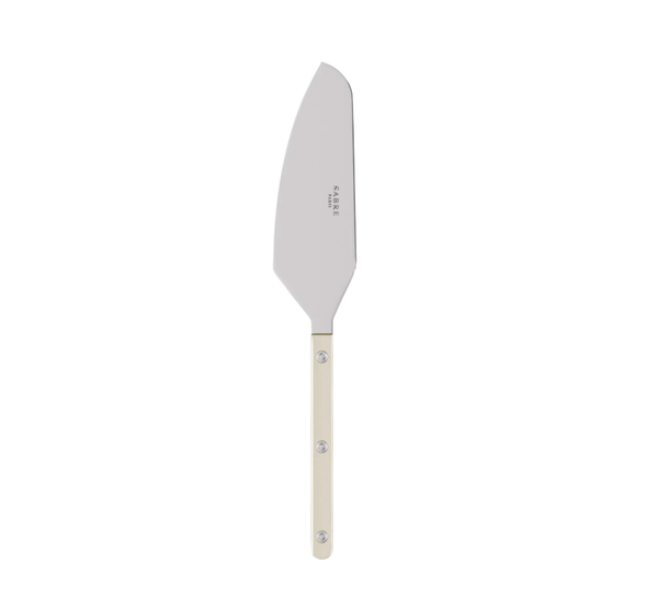 The Bistrot Pearly Tart Slicer by Sabre, featuring a straight ivory-hued handle and a wide, angled stainless steel blade, is displayed on a plain white background—an elegant example of customizable tableware that effortlessly combines both function and style in your collection.