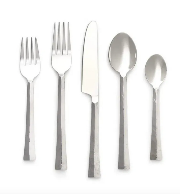 Set of silver cutlery including forks, knife, and spoons on a white background
