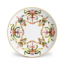 L’Objet Grand Tour dinner plate in white porcelain featuring a symmetrical, colorful floral pattern and 24k gold accents.