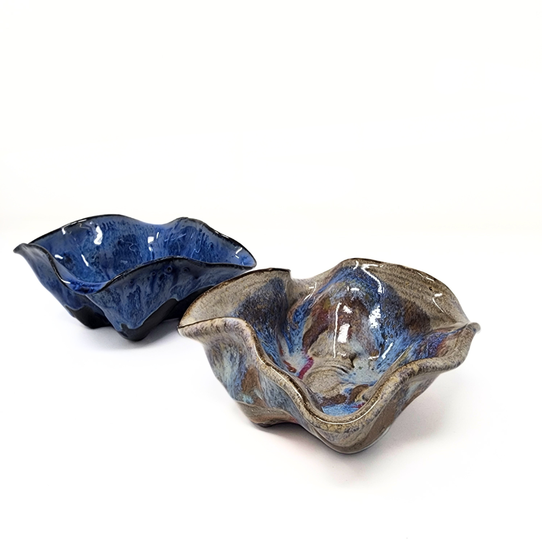 Euphoria Bowl small in both dripping blue and monet's sky. 