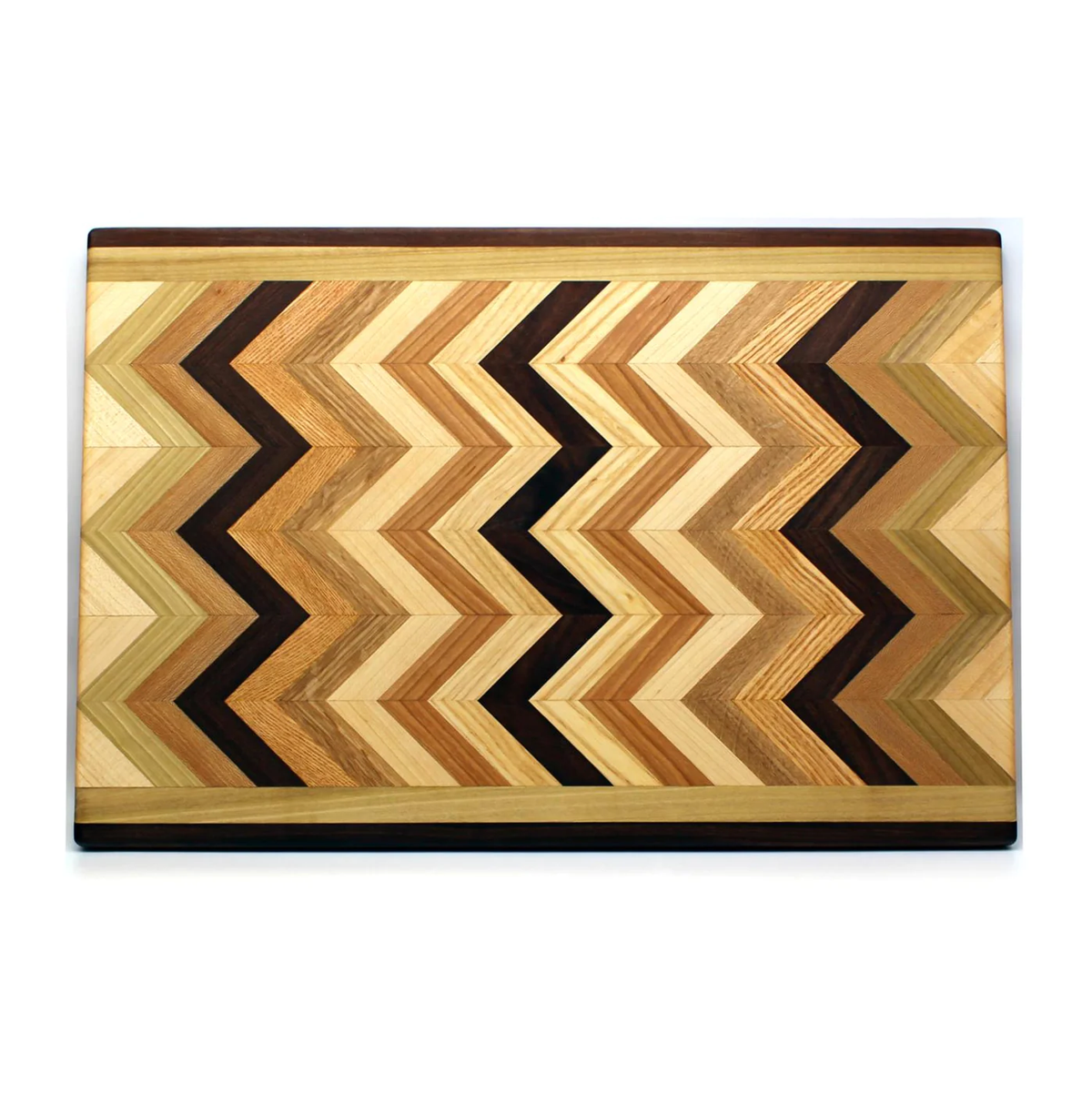 Multiwood Herringbone Serving Board by Dickinson Woodworking features a rectangular design with a striking chevron pattern crafted from a blend of light, medium, and dark wood tones, creating an eye-catching zigzag effect across the surface.