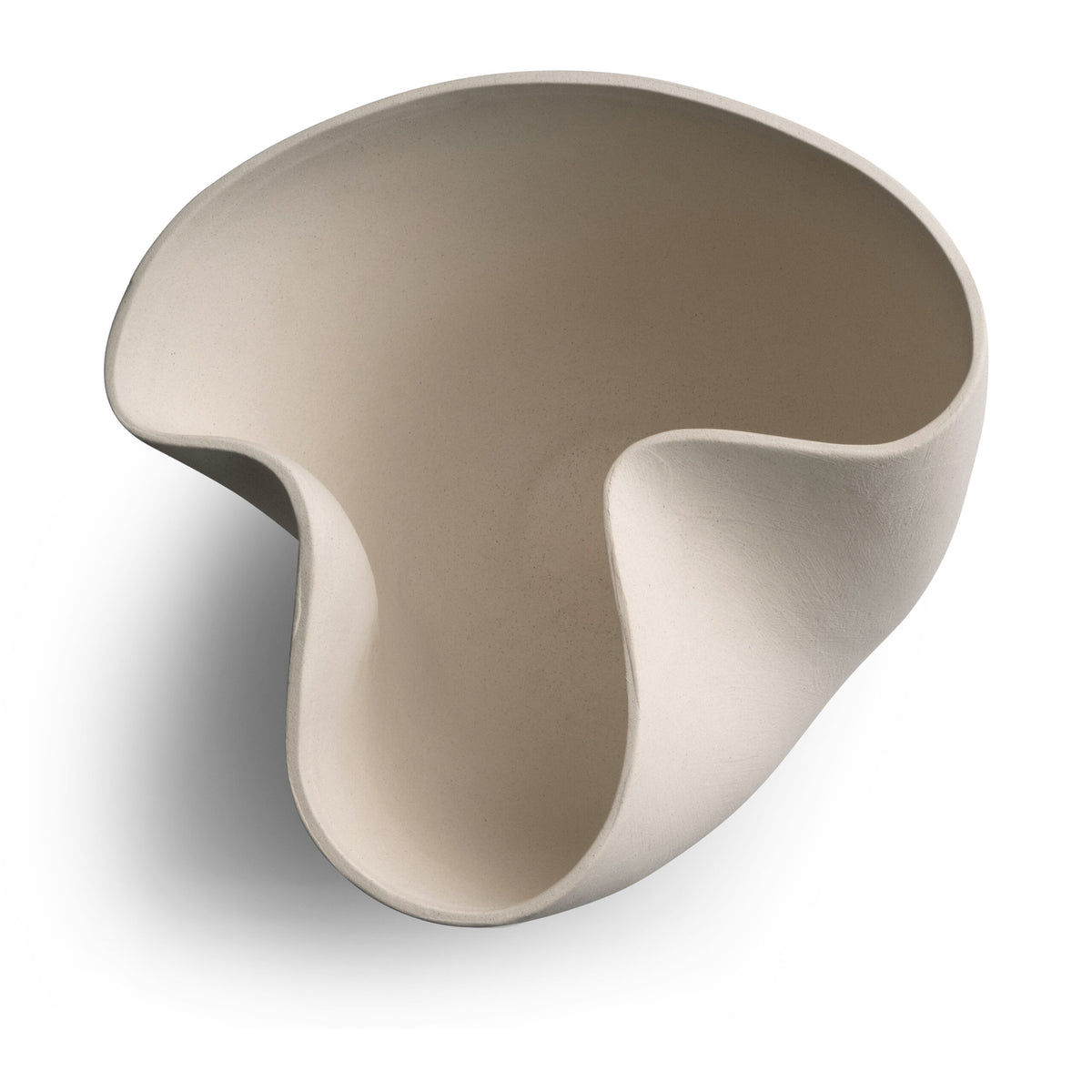 The Carmen Vase by FlowDecor Inc. is a white, asymmetrical ceramic piece with smooth curves and an abstract silhouette, featuring an irregular organic shape that casts a soft shadow on a white background.