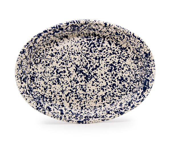 The Splatterware Oval Platter Navy & Cream by Crow Canyon Home is a ceramic plate with a white base and navy splatter pattern, easy-to-clean porcelain finish, shown against a white background.