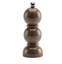 The Addison Ross Mini Bobbin Salt & Pepper Shaker is a glossy, brown, round-shaped pepper mill crafted from durable rubber wood, featuring three stacked spheres and a silver knob on top. It is equipped with a high-quality ceramic mill mechanism and is set against a white background.